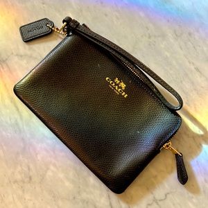 Small Black Leather Coach wristlet with strap